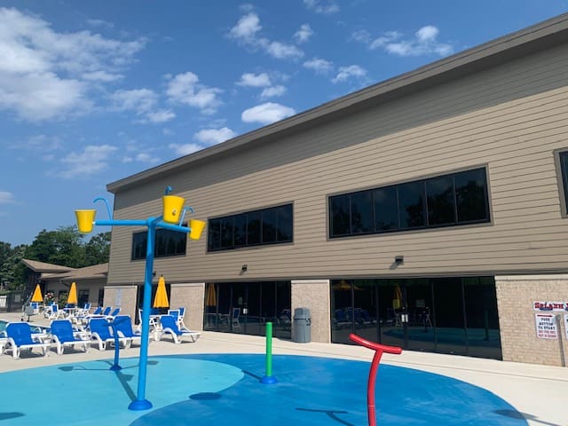 Village of Four Seasons aquatic center siding view 3